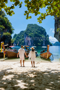 h Loa Lading Krabi Thailand part of the Koh Hong Islands in Thailand. beautiful beach with limestone cliffs and longtail boats