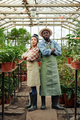 Successful Greenhouse Workers Portrait - PhotoDune Item for Sale
