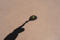 Shadow of padel racket over ball - PhotoDune Item for Sale