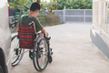 Manual wheelchair use training for the person with disability. - PhotoDune Item for Sale