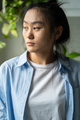 Portrait of unhappy sad young Asian woman at home - PhotoDune Item for Sale