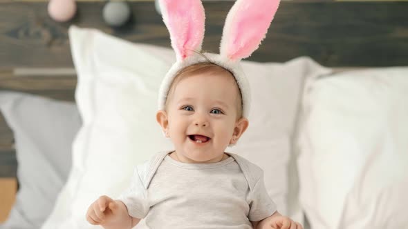 Portrait of adorable baby girl with bunny ears