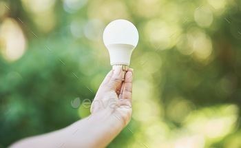 Nature, renewable energy and eco friendly lightbulb in garden and innovation, saving the planet and