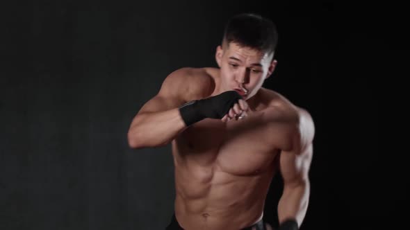 Young Shirtless Fit Man Boxer Showing His Moves