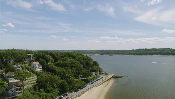 Flying Over a Harbor By a Small Town in The United States