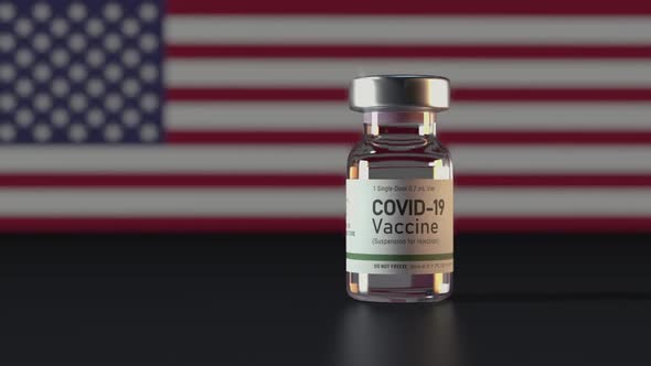 Covid Vaccine Ampule with USA Flag in Background