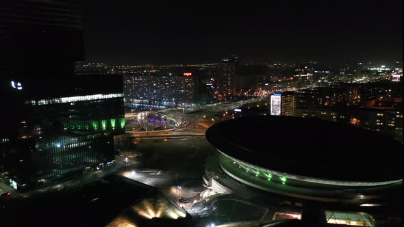 Aerial view of the center of Katowice and The roundabout Generała Ziętka - Day to night transition.