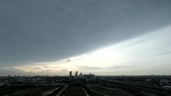 Time lapse beautiful twilight fluffy storm cloudy blue sky in cityscape