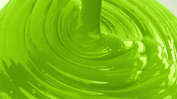 Green Paint Pouring Closeup