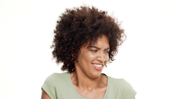 Annoyed Young Beautiful African Girl Over White Background