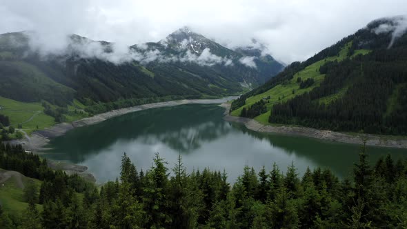 Aerial View of Schlegeisspeicher Lake and Pine Trees in Zillertal Tirol Austria