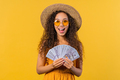 Rich excited curly haired woman with cash money - USD currency dollars banknotes - PhotoDune Item for Sale