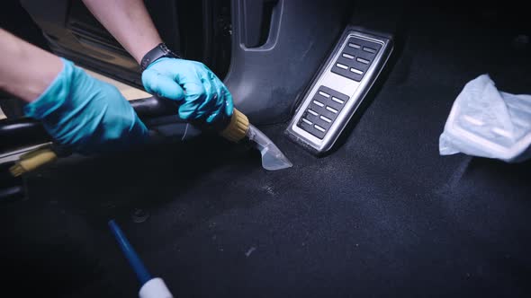 Cleaning a Car Carpet with a Washing Vacuum Cleaner