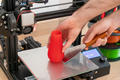 Modern 3D printer and multi-colored filament spools - PhotoDune Item for Sale