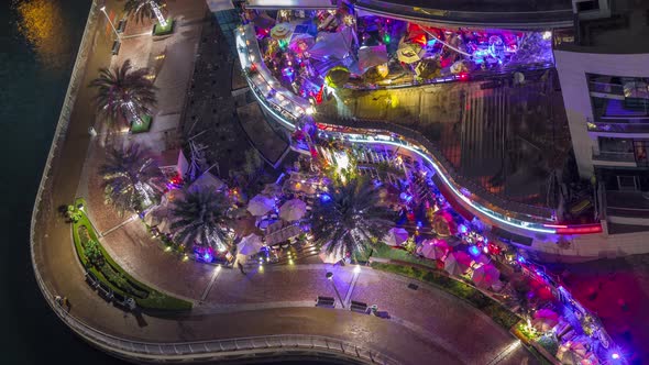 Waterfront Promenade in Dubai Marina Aerial Night Timelapse