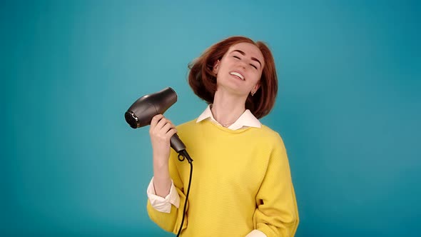 Model with Hair Waved By Hairdryer