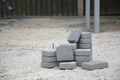 Small pile of gray walkway slabs lying in stack outdoors - PhotoDune Item for Sale