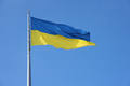 Ukrainian flag isolated on the blue sky with clipping path - PhotoDune Item for Sale