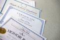 A honor roll recognition, certificate of achievement and high school diploma - PhotoDune Item for Sale