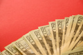Big amount of old twenty dollar bills on bright red background - PhotoDune Item for Sale