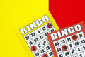 Yellow and red bingo boards or playing cards for winning chips - PhotoDune Item for Sale