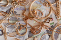Many expensive golden jewerly rings, earrings and necklaces - PhotoDune Item for Sale