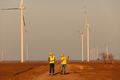 Two wind engineers at a wind farm. - PhotoDune Item for Sale