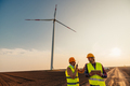 Two workers on a wind turbines farm. - PhotoDune Item for Sale