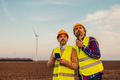 Two engineers at windmill field - PhotoDune Item for Sale