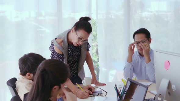 Unhappy Business People in Group Meeting After Project Failure