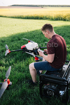 smart agriculture industry concept, drone in precision farm use for spray a water.