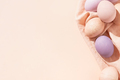 Easter background with colorful pastel eggs on linen napkin. - PhotoDune Item for Sale