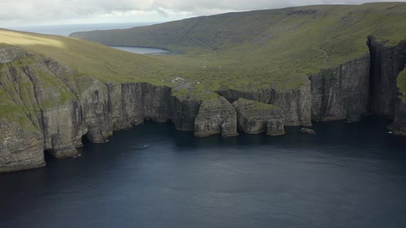 Drone Towards Cliffs And Coastline Of Suduroy