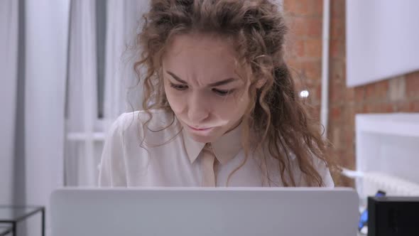 Frustrated Angry Female Working on Laptop in Office