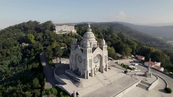 Aerial view around the Santuário de Santa Luzia, in sunny Viana Do Castelo, Portugal - orbit, drone