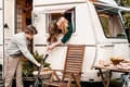 Children,family,brother sister traveling in camper,house on wheels. Trailer motor home.Looking in  - PhotoDune Item for Sale