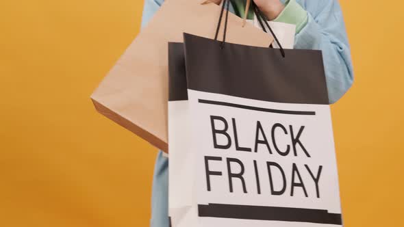 Black Friday Video Footage - A Person Holding A Black Friday Shopping Bag