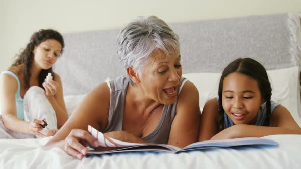 Happy family relaxing on bed in bed room 4k