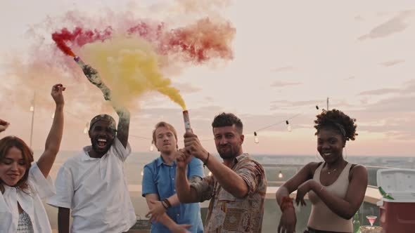 Group of Happy People Partying on Rooftop