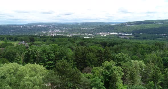 A drone shot of the the valley and town of Ithaca New York.