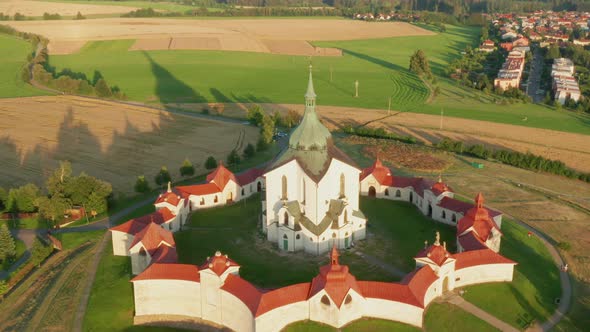 Flying Above the Pilgrimage Church of Saint John of Nepomuk on the Green Hill at Sunset