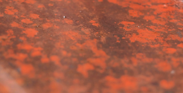 Snow Falls On Iron Plate And Melts Away