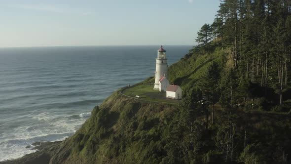 Slowly panning across Haceta Head lighthouse in Oregon