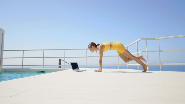 Beautiful young woman doing yoga