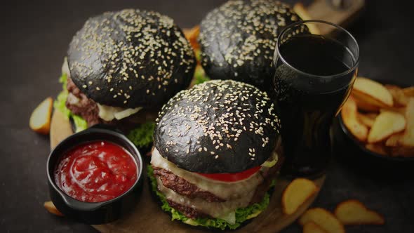 Delicious Black Hamburger with Patties and Cheese