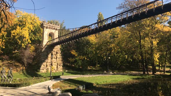 High suspension bridge in the park slow pan 3840X2160 UltraHD  footage - Autumn in Romanian city of 