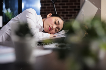 piness after overtime working hours. Tired executive manager with burnout syndrome sleeping at work because of extreme fatigue.