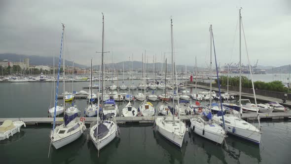 Private Boats Moored at Yacht Club Dock, Bad Weather for Sailing in Open Sea