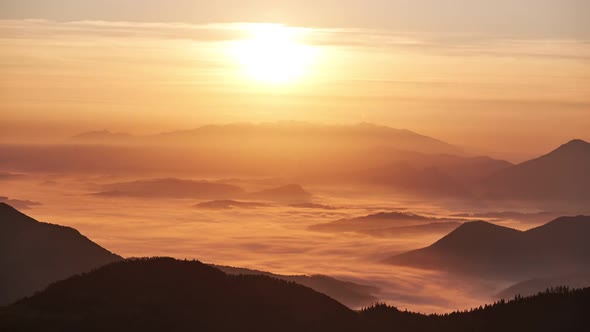 Sunrise over the misty mountain landscape  FHD