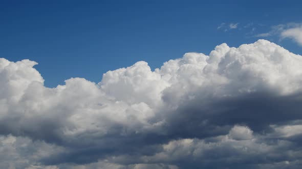 Bright Cumulus Rain Clouds Moving On The Sky